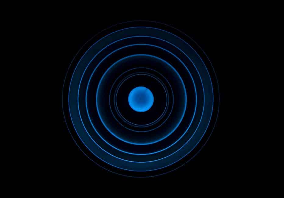 Blue concentric circles symbolizing how to find your center and energetic alignment