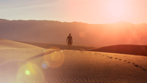 Hero image for man walking in the desert on a Shamanic Vision Quest